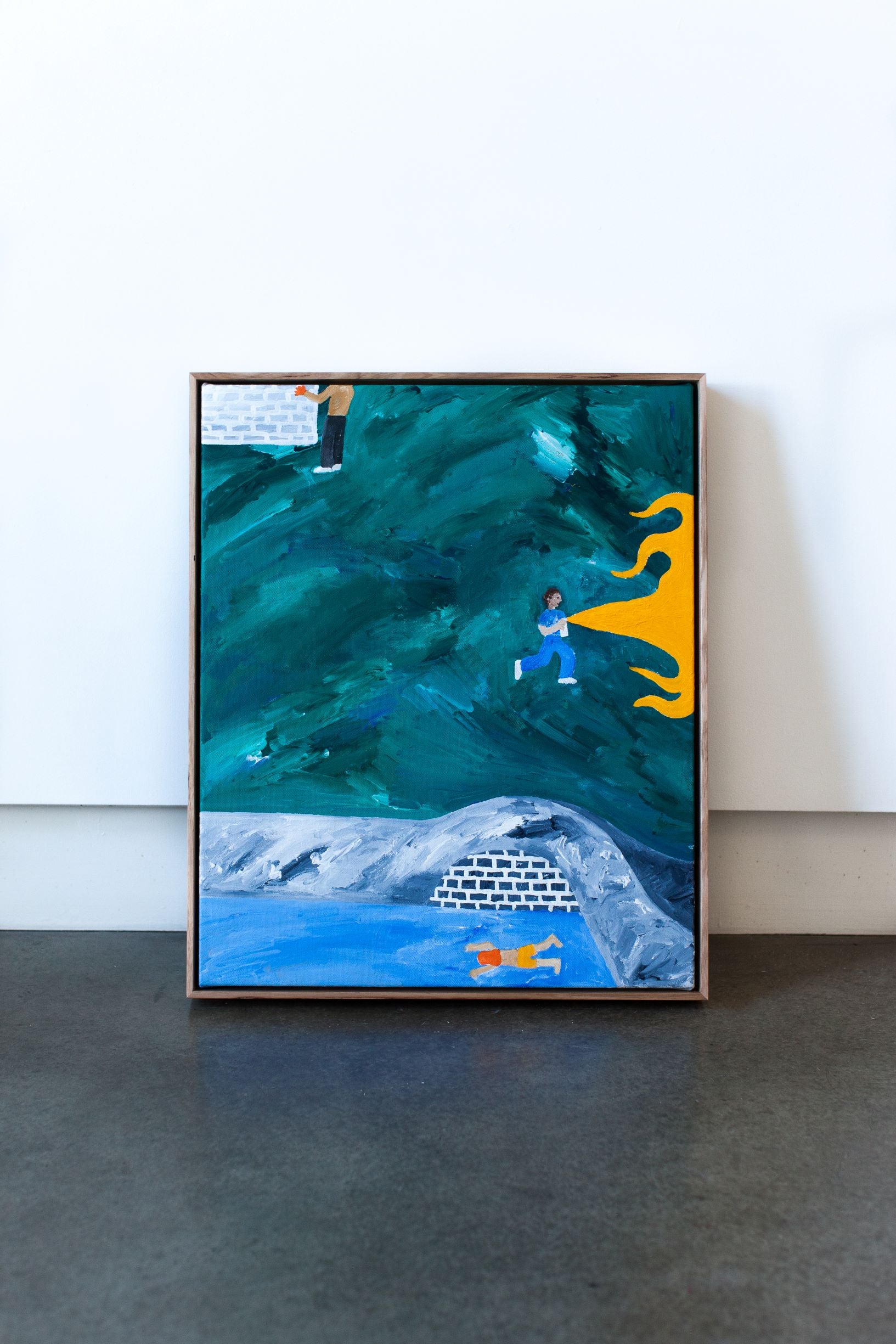 Painting with blue, in yellow shorts, 2021
