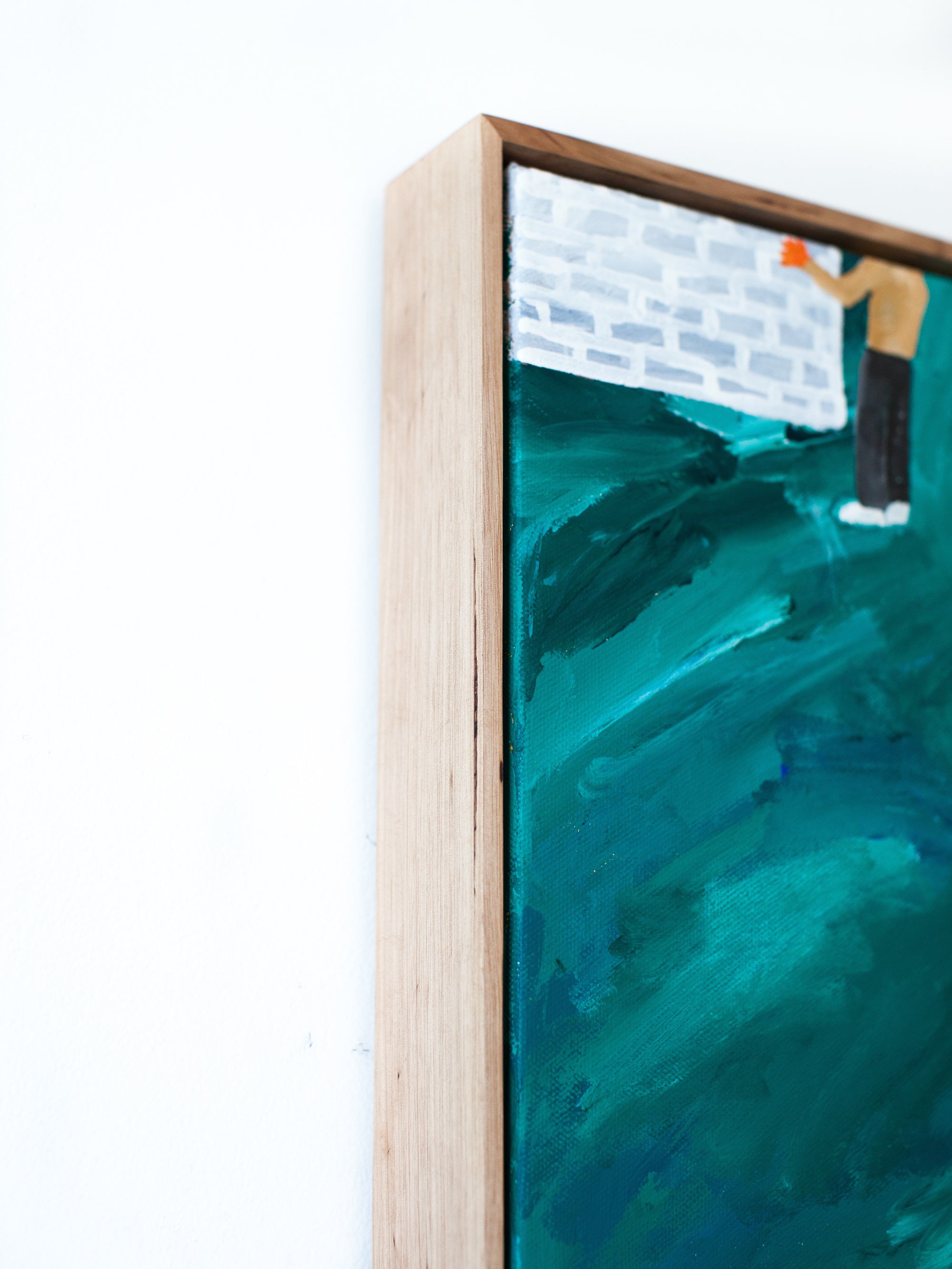 Painting with blue, in yellow shorts, 2021